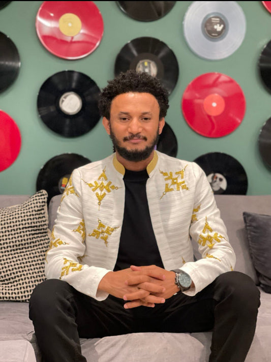 Ethiopian Elegance: Golden Embroidered Men's Long Sleeve T-Shirt with Habesha Libs