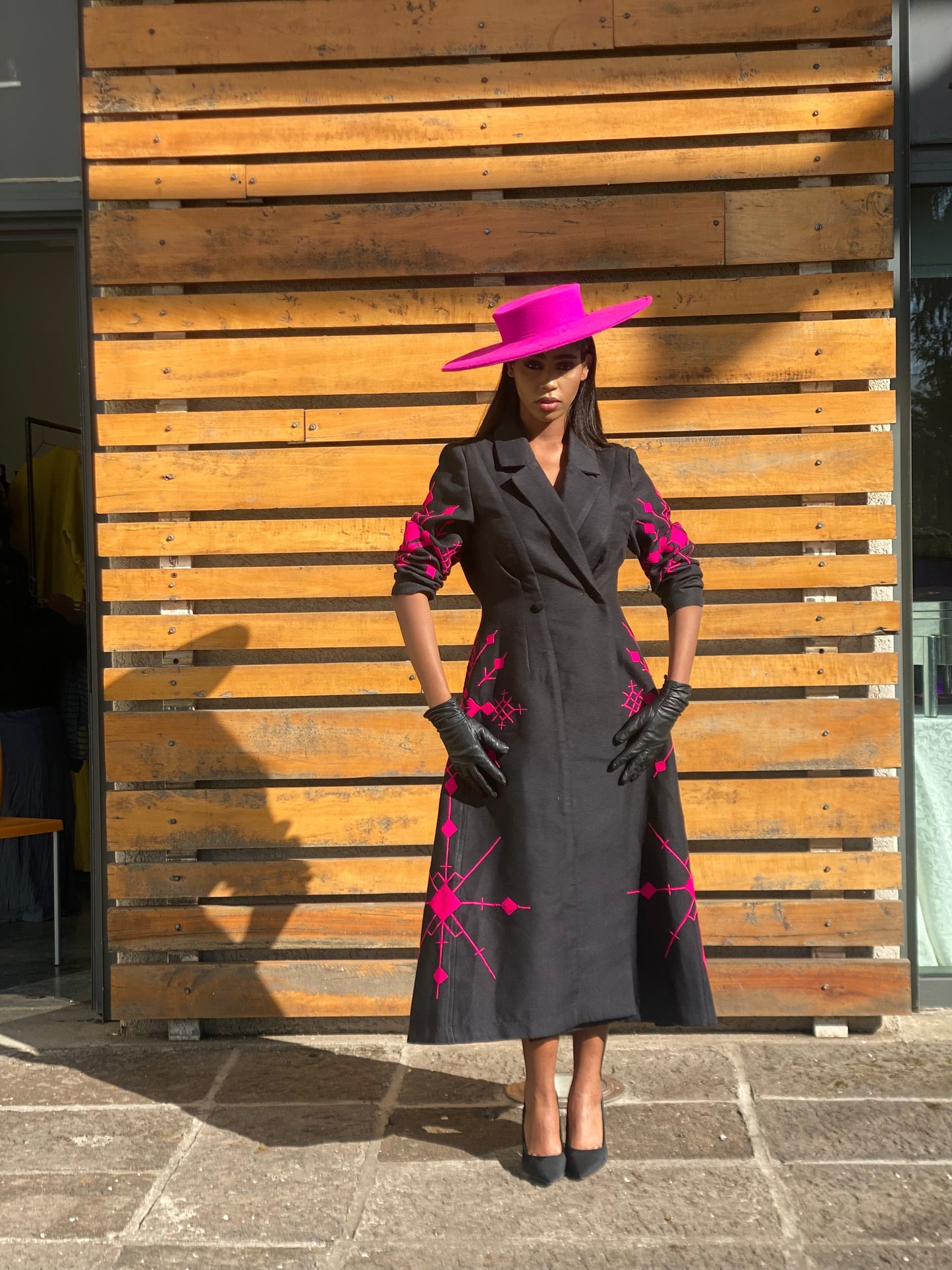 Elegant Long Coat with Pink Embroidery and Matching Hat