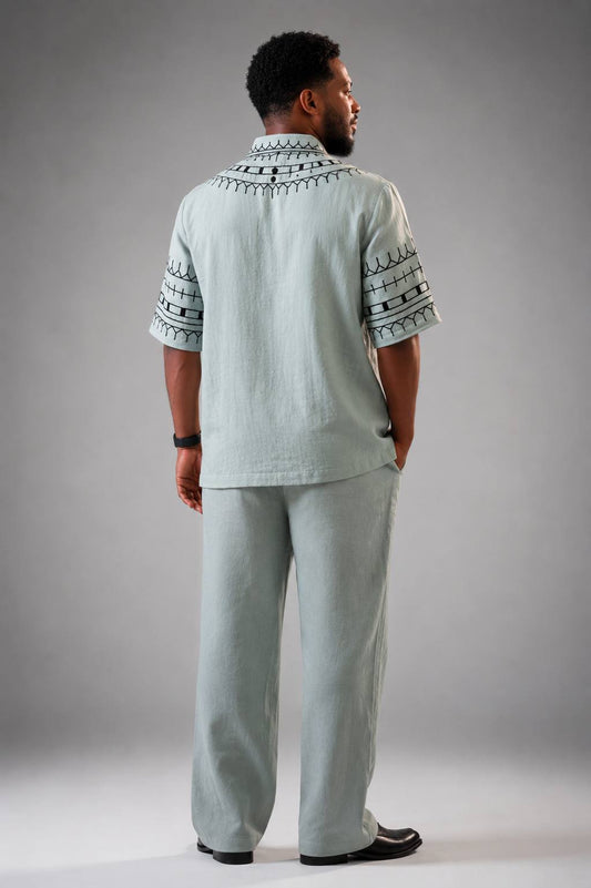 Ethiopian Elegance: Light Blue Habesha Shirt and Trouser Set with Black Embroidery
