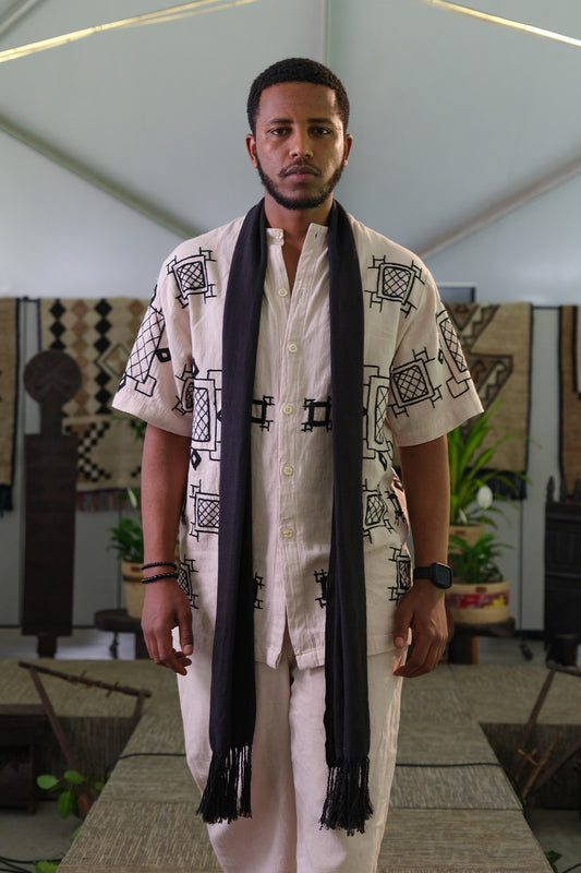 Elegant Heritage: Stylish Men's Habesha Fetil Fabric Outfit with Black Embroidery